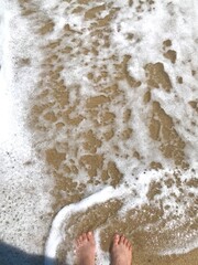 feet on the beach