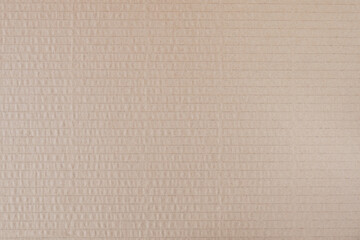 Textured brown cardboard as a background.Texture or background