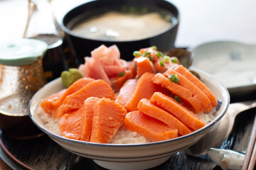 Salmon sashimi and salmon roe with rice bowl or donburi in Japanese style food