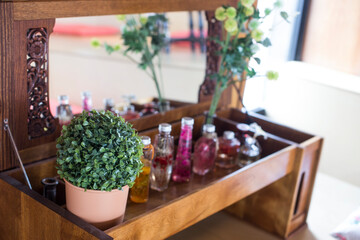 vintage dressing table with decor and bottle of perfume.