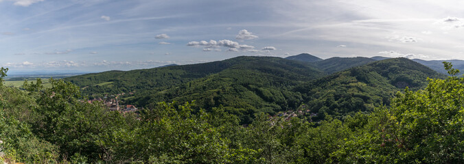Naklejka na ściany i meble mountain landscape panorama with trees and clouds in France