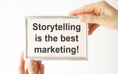 Storytelling is the best Marketing - man holding a signboard with a text on it