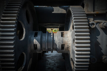 Fototapeta na wymiar Close up of gears in heavy machinery