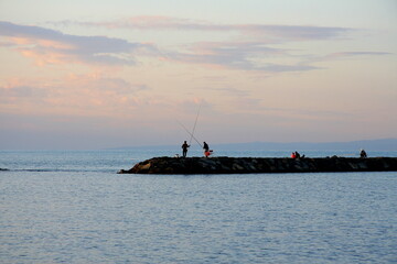 Fototapeta premium Fishing at the sunset