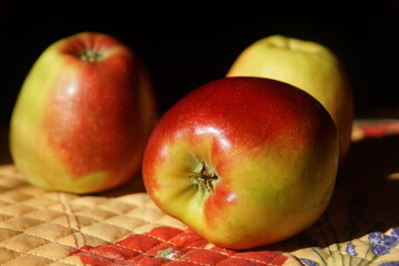 still life with red and green apples