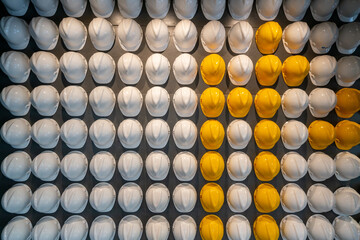 Safety helmets lined up on the wall