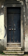 old wooden door in a stone wall