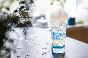 cocktail drink Blue colour
ice and liquor alcohol or non-alcoholic tonic soda beverage food background top view copy space