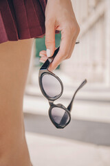 Black sunglasses. Woman beauty. Sunglasses. 