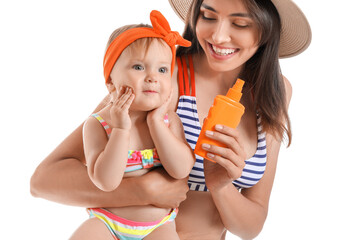 Mother and her little daughter with sunscreen cream on white background