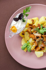 Mushrooms with onions and country fried potatoes with sauce