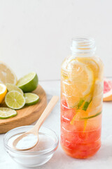 Sports isotonic drink with lime, lemon, grapefruit