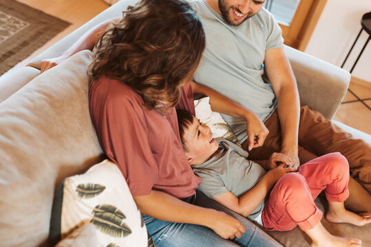 Young Family Having Fun At Home