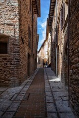 Fototapeta na wymiar typical narrow street in the old town of Spello, Umbria, Italy