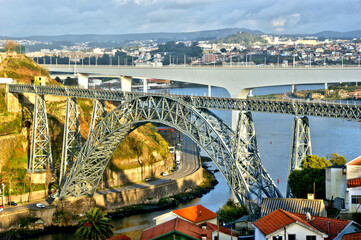 Old and new railway bridges over Douro river in Oporto, Portugal