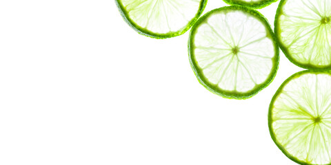 Green lime slices isolated on white background. Food texture. Copy space for text.