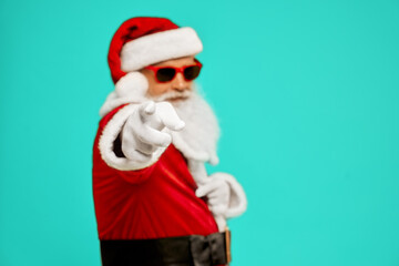 Fototapeta na wymiar Santa Claus pointing at camera.