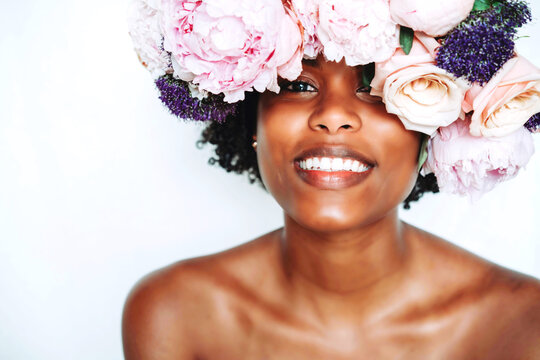 Black woman with afro and flower crown