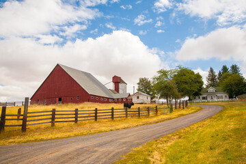 A red barn in the fall season in the palouse wheat country in southeastern Washington. © Bob