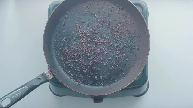 Close up of a Frying Pan with Black Sesame 