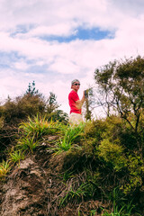 Rocky cliffs with hiking man