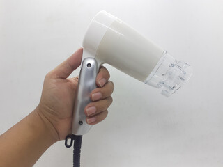 Fototapeta premium Woman Beauty and Fashion Device Accessories Hair Dryer in White Isolated background