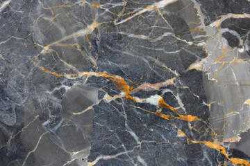 Gold, yellow and white patterned of Dark gray marble pattern (Gold Russia), marble texture for design.