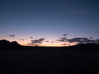 Gorgeous blue and orange sunset captured from the Vedauwoo Climbing Area in Buford, Wyoming.