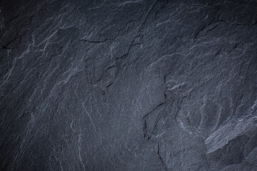 Dark grey and black slate background or texture