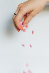 Pink chocolate in hand