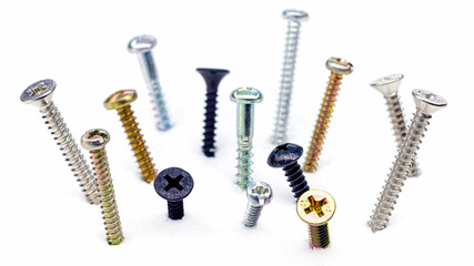 Various screws on a white background.
