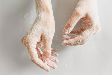 Fototapeta premium woman hands in flour 