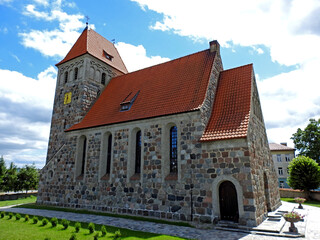 Fototapeta na wymiar built in 1924, the Catholic Church of the Assumption of the Blessed Virgin Mary in Kalinowo in Warmia and Masuria in Poland