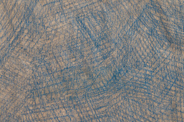 blue crayon drawing on recycled paper background texture