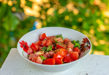 Vegetable green salad with tomatoes and Fresh Lettuce. Green salad close-up.