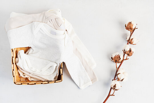 Cute Newborn Clothes. Organic Cotton Baby Apparel Mockup. Flat Lay, Top View