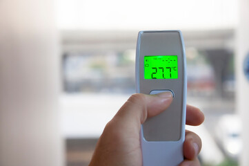 Digital Infrared Thermometer for check forehead temperature measurement scan from Coronavirus pandemic 2019 (COVID-19).