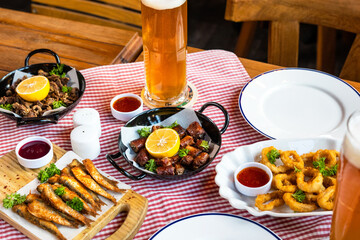 Tasty meat meal roulette with lemon, sprat and beer