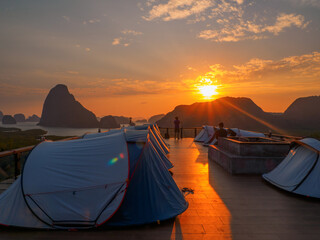 Camping tents with sunrise at Samet nangshe viewpoint
