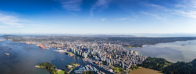 Downtown Vancouver, British Columbia, Canada. Aerial Panoramic View of the Modern Urban City, Stanley Park, Harbour and Port. Viewed from Airplane Above during a sunny day. - obrazy, fototapety, plakaty