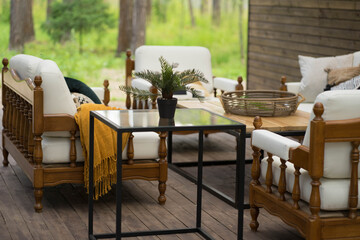 white sofa with pillows on the veranda