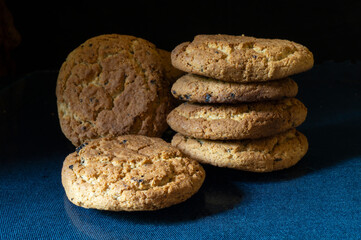 Heap oat liver rests upon table on black background