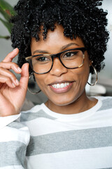 Young smart black woman wearing glasses