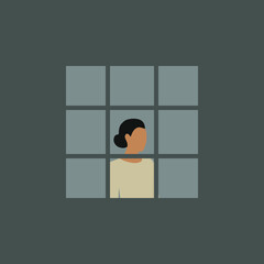 Woman at the window behind bars