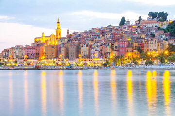 Menton mediaeval town on the French Riviera in the Mediterranean during sunset, France.
