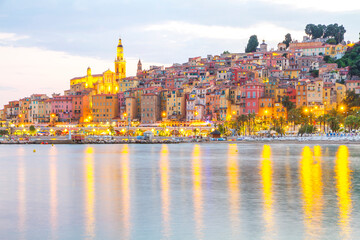 Menton mediaeval town on the French Riviera in the Mediterranean during sunset, France.
