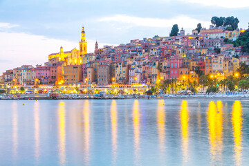 Menton mediaeval town on the French Riviera in the Mediterranean during sunset, France.
