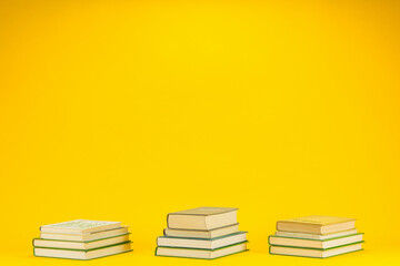 Three small book columns.