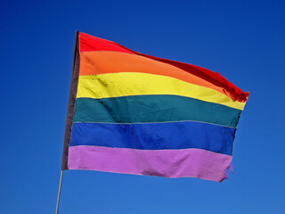 LGBT flag and blue sky, Ipanema, Rio