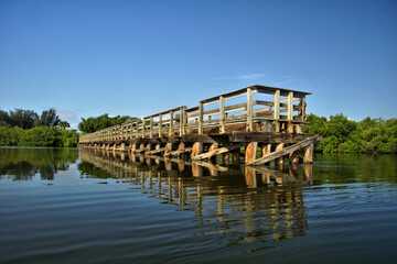 Fishing pier on Coral Creek near the Intercoastal Waterway in Placida, Florida     